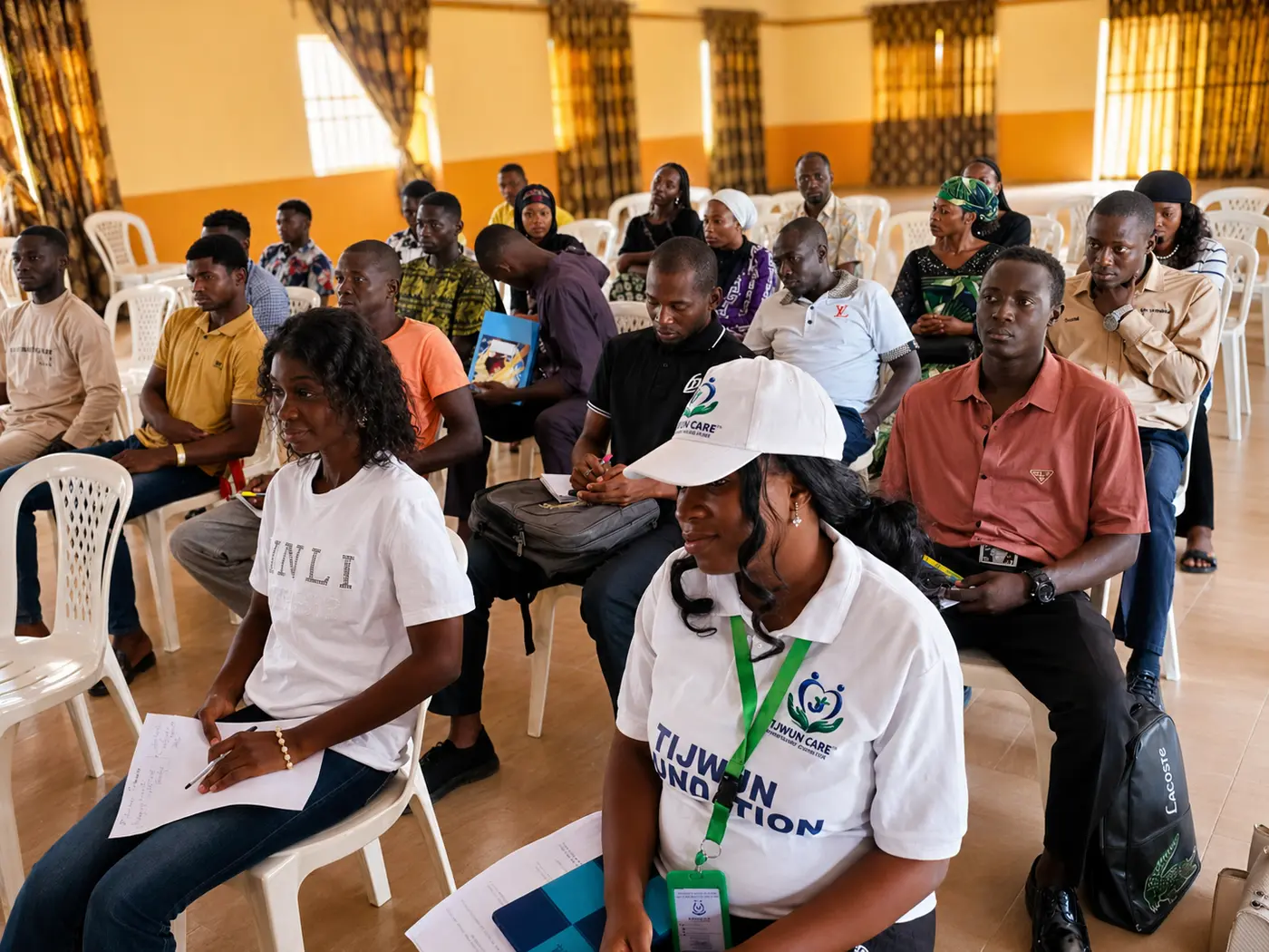 Youth and community members at a TIJCEF capacity-building session.